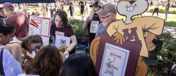 The University Archives talks about the early mascots Freshman students at the University of Minnesota during Welcome Week on Friday, August 30, 2024. (Photo/Adria Carpenter)